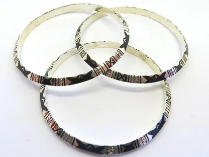 Empowering Charms: Tuareg & Moroccan Berber Protective Bangles - BOHO Jewelry Embellished with Sterling Silver, Lacquer, and Handcrafted Tribal Ethnic Charms