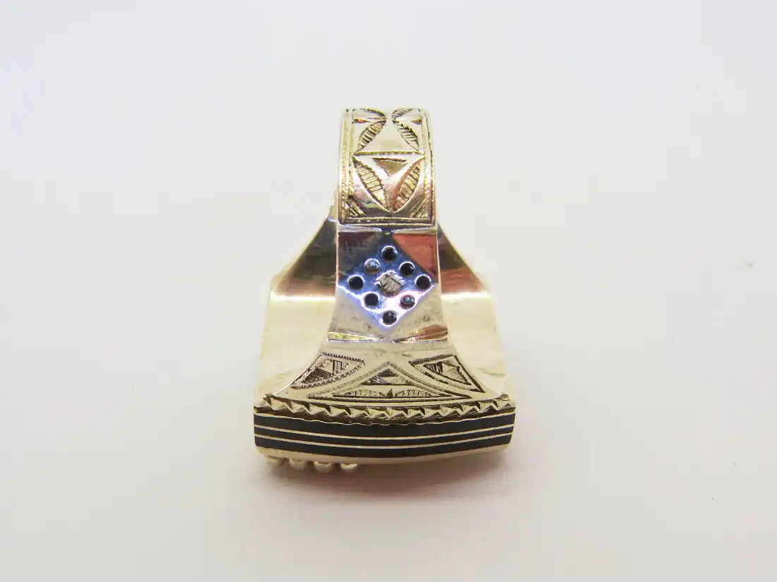 Legacy Reverberations: Exquisitely Crafted Cubic Tuareg Berber Ring - Sterling Silver, Amber, Ebony Wood, and Chevron Bead