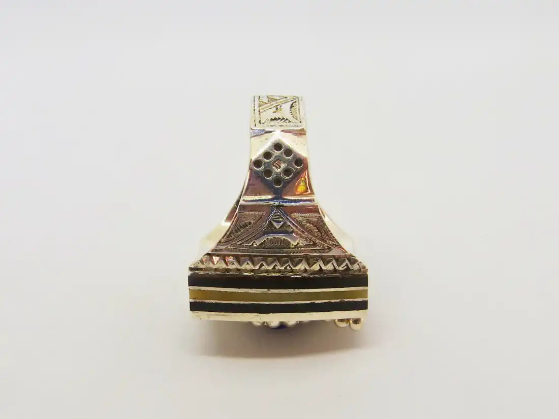 Unveiling Traditions: Meticulously Crafted Cubic Tuareg Berber Ring with Sterling Silver, African Amber, and Ebony Wood - A Tribute to Tribal Artistry and the Timeless Magic of the Chevron Bead