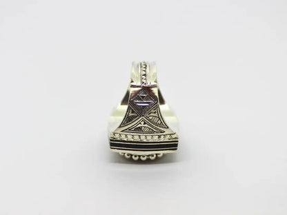 Ancestral Echoes: Cubic Tuareg Berber Ring - Sterling Silver, Ebony Wood, and Chevron Bead Heritage