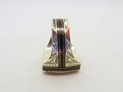 Heritage Resonance: Cubic Tuareg Berber Ring - Sterling Silver, Copper, Amber, Ebony Wood, and Chevron Bead Magic