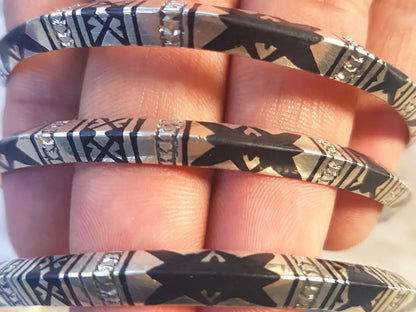 Empowering Charms: Tuareg & Moroccan Berber Protective Bangles - BOHO Jewelry Embellished with Sterling Silver, Lacquer, and Handcrafted Tribal Ethnic Charms