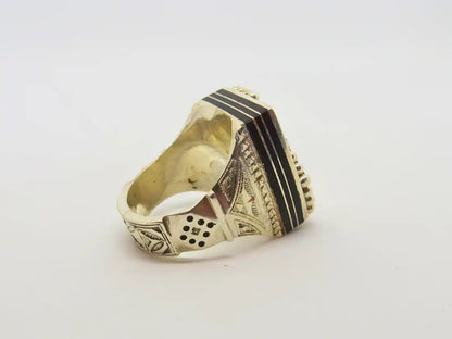 Legacy Reverberations: Exquisitely Crafted Cubic Tuareg Berber Ring - Sterling Silver, Amber, Ebony Wood, and Chevron Bead