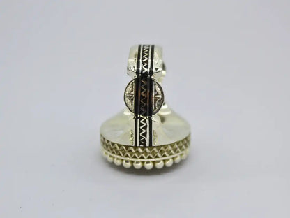 Echoes of Antiquity: Tuareg Berber Oval Ring with Sterling Silver, Copper, Ebony Wood, and Chevron Bead