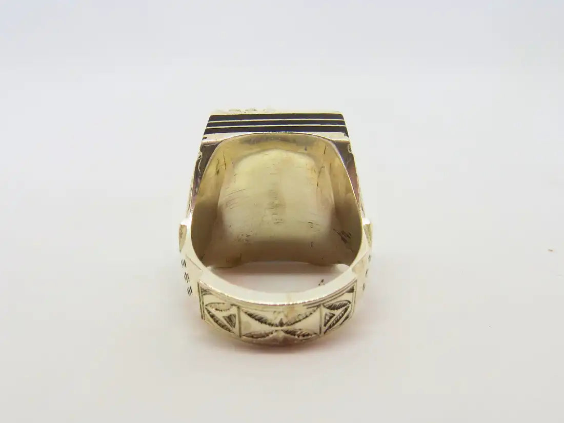 Legacy Reverberations: Exquisitely Crafted Cubic Tuareg Berber Ring - Sterling Silver, Amber, Ebony Wood, and Chevron Bead