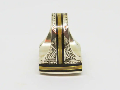 Enigmatic Resonance: Cubic Tuareg Berber Ring - Sterling Silver, Amber, Copper, and Ebony Wood Infused with Tribal Artistry and Chevron Bead Protection