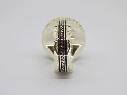 Echoes of Antiquity: Tuareg Berber Oval Ring with Sterling Silver, Copper, Ebony Wood, and Chevron Bead